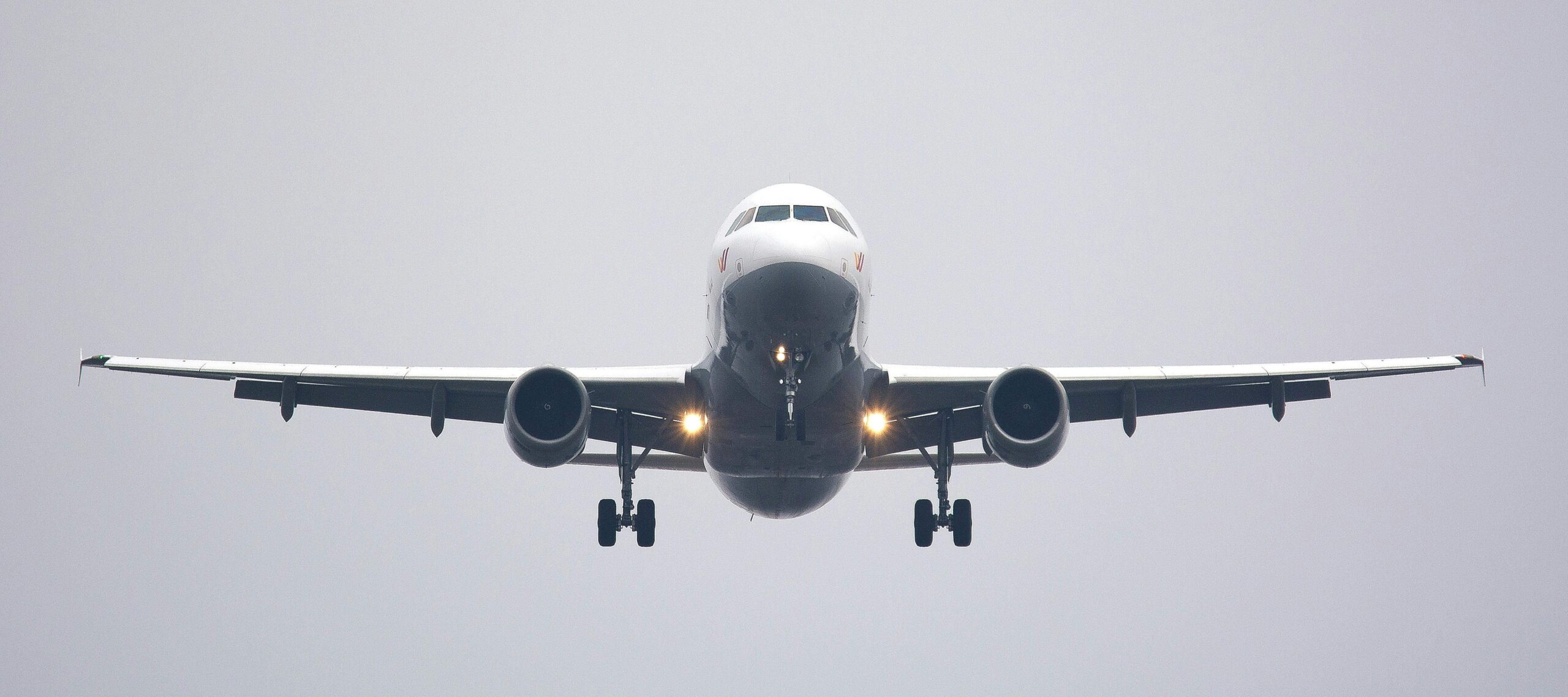 Airplane flying with landing gears open