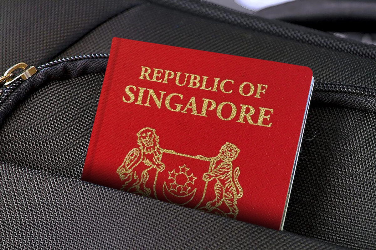 Close up of Singapore Passport in Black Suitcase Pocket