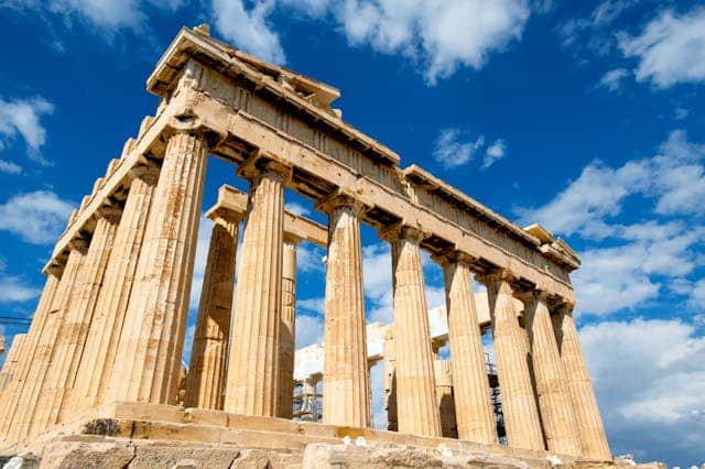 A Greece travel guide Low angle photograph of the Parthenon/Acropolis during daytime.
